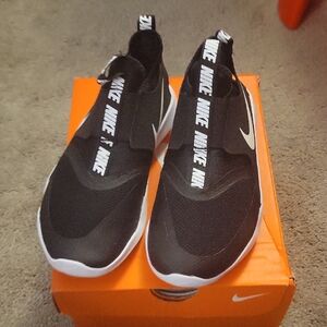 BRAND NEW NEVER WORN Nike Black and White Slip-On Shoes